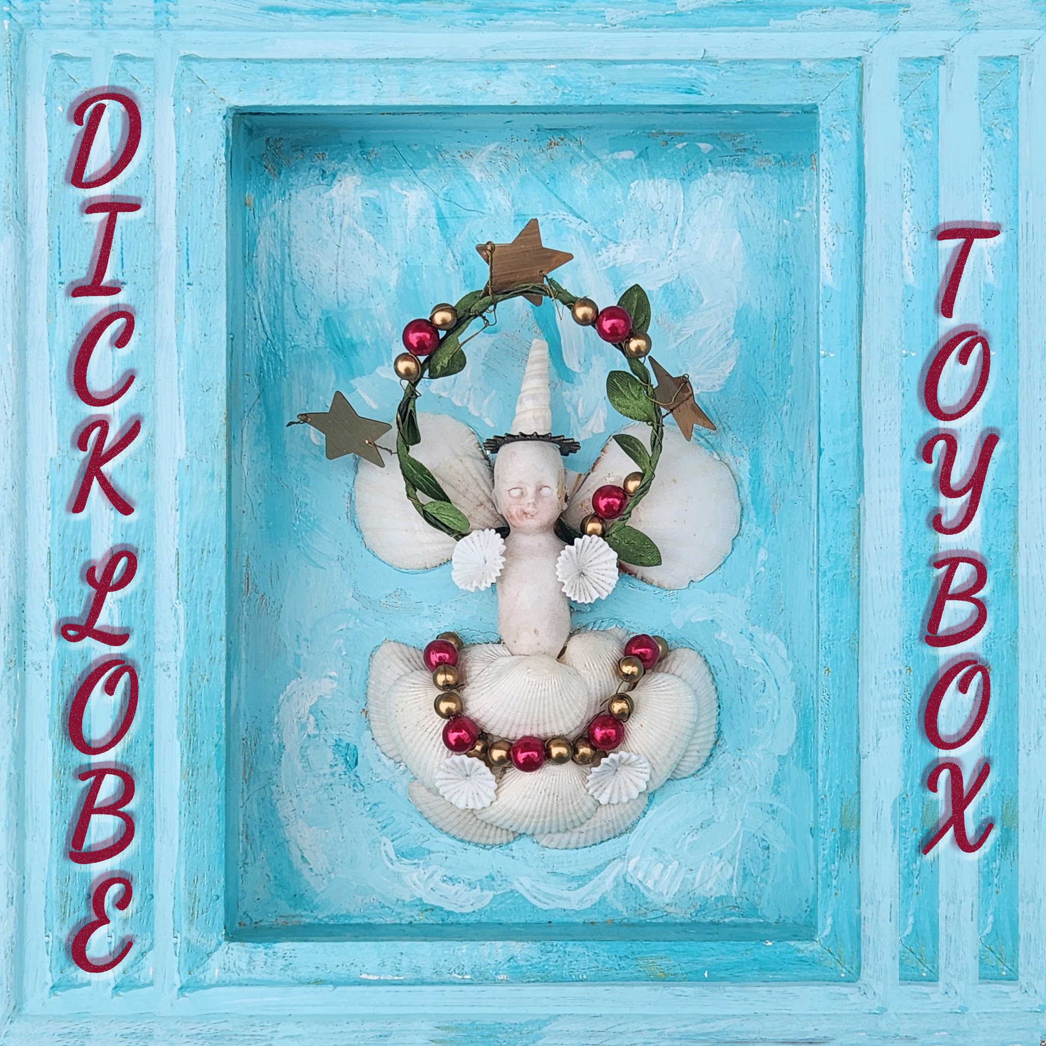 Toybox album cover by Dick Lobe, featuring a shell sculpture in a turquoise frame.